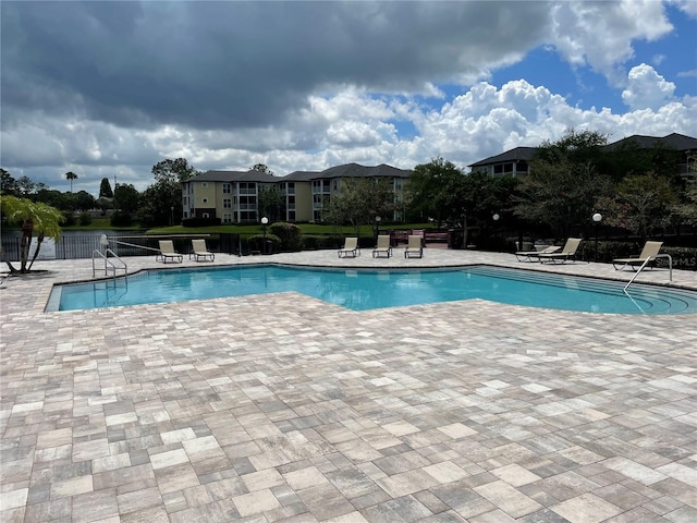 view of swimming pool featuring a patio