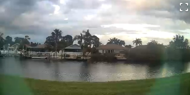 property view of water featuring a dock