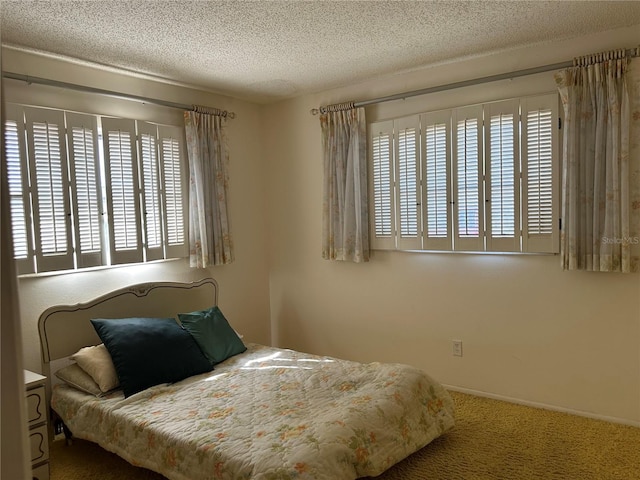 bedroom featuring a textured ceiling