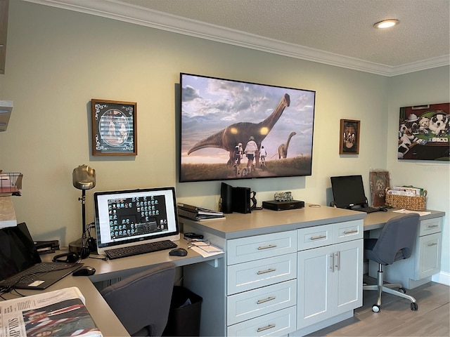 home office with crown molding, a textured ceiling, and light hardwood / wood-style floors