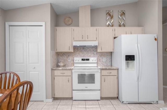 kitchen with light brown cabinetry, light tile patterned floors, backsplash, and white appliances