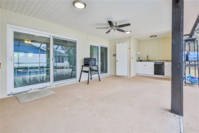 view of patio featuring ceiling fan