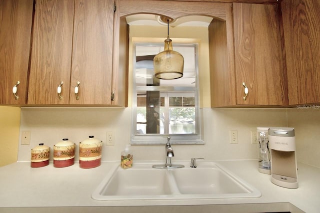 kitchen with sink and hanging light fixtures