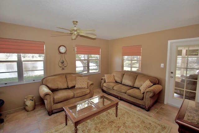 living room featuring ceiling fan