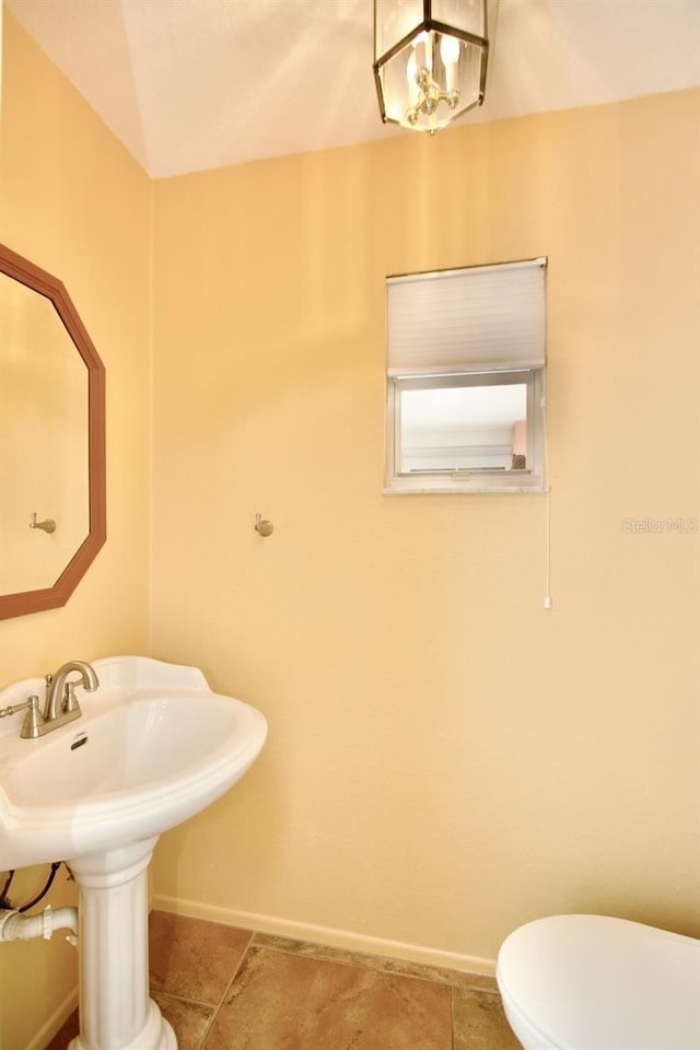 bathroom with sink and toilet