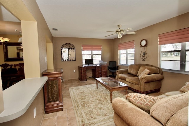 living room featuring ceiling fan