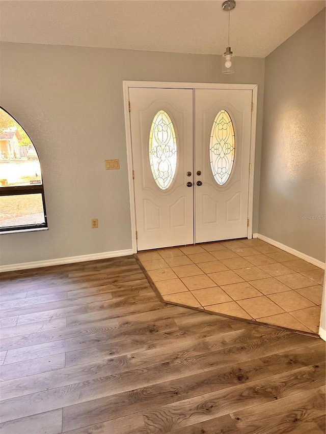 foyer entrance featuring hardwood / wood-style flooring