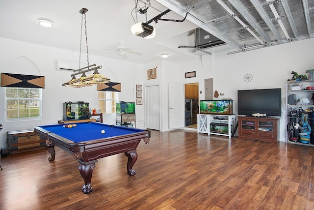 playroom with independent washer and dryer, pool table, wood-type flooring, electric panel, and ceiling fan