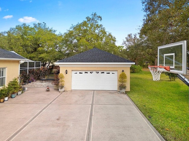 garage with a lawn