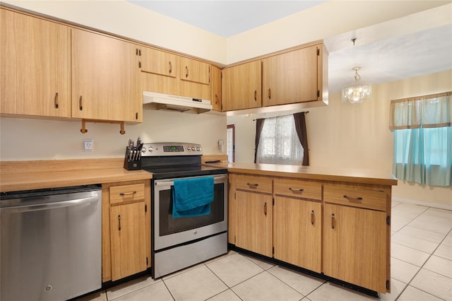 kitchen featuring light tile patterned floors, hanging light fixtures, stainless steel appliances, kitchen peninsula, and light brown cabinets