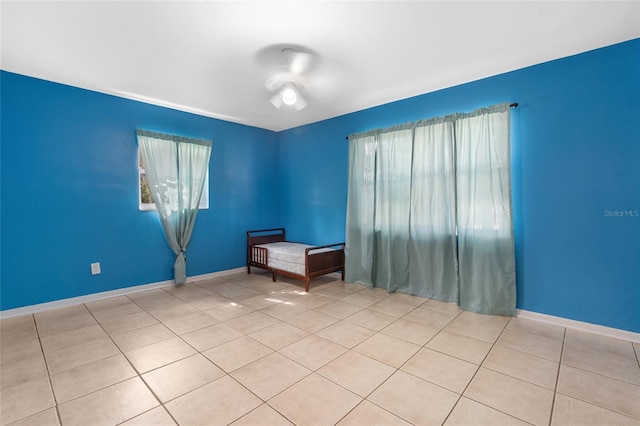 unfurnished room with light tile patterned floors