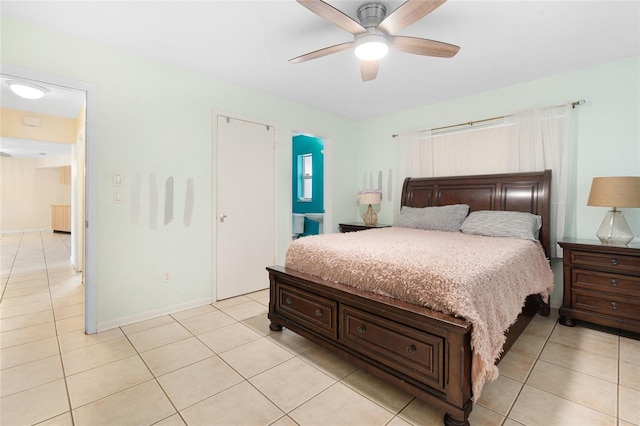 bedroom featuring ceiling fan and light tile patterned flooring