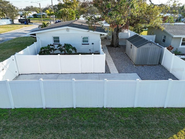 exterior space with a storage shed