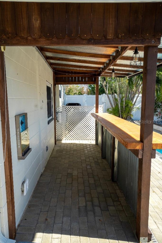 view of patio with a bar