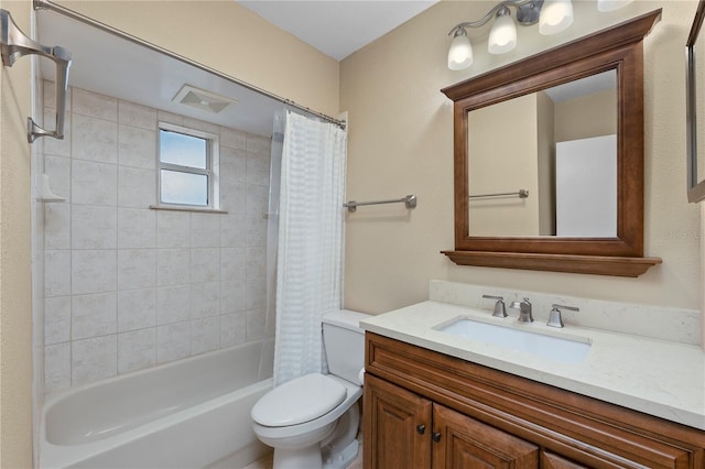 full bathroom featuring vanity, toilet, and shower / tub combo