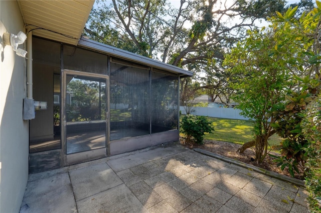 view of patio / terrace with a sunroom