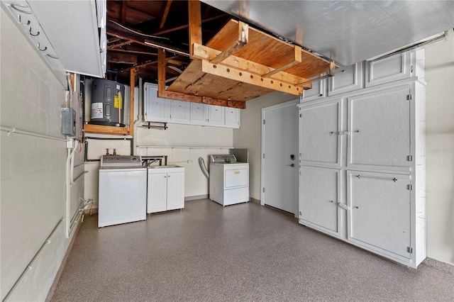 interior space featuring separate washer and dryer and water heater