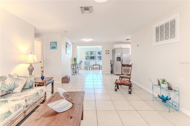 living room featuring light tile patterned floors