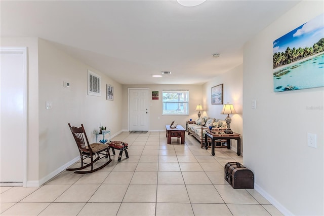 living area with light tile patterned floors