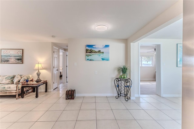 corridor with light tile patterned flooring