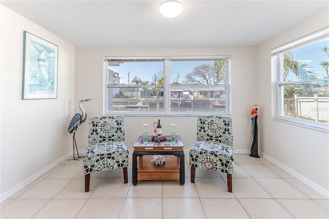 living area with light tile patterned floors