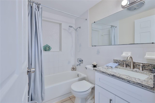 full bathroom with tile walls, vanity, tasteful backsplash, shower / bath combination with curtain, and toilet