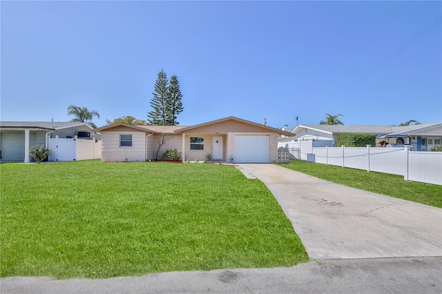 single story home featuring a garage and a front lawn