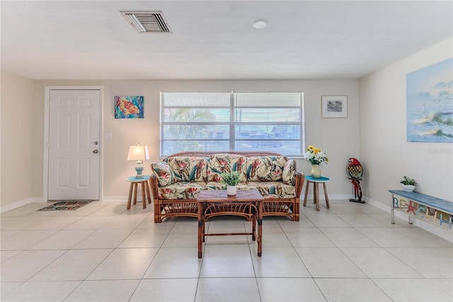 living room with light tile patterned floors