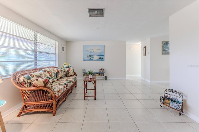 living room featuring light tile patterned flooring