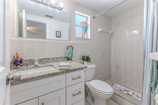 bathroom with toilet, tile walls, backsplash, a shower with shower curtain, and vanity