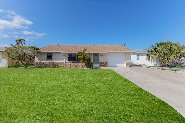 single story home with a garage and a front yard