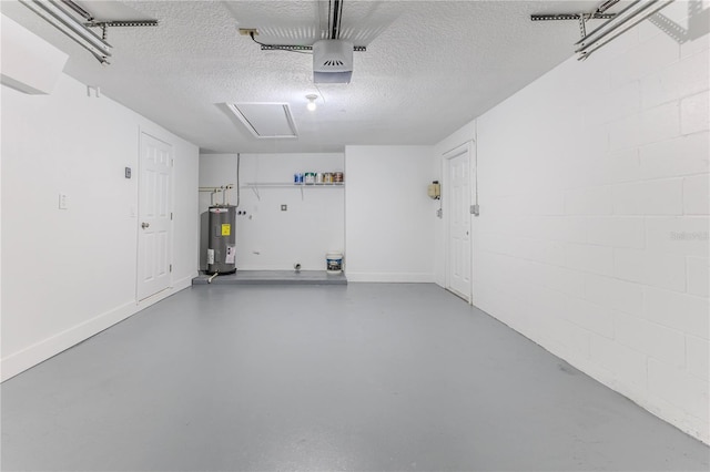 garage with a garage door opener and water heater