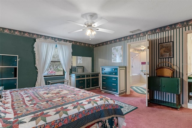 carpeted bedroom with connected bathroom and ceiling fan