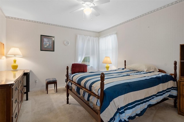 bedroom with light colored carpet and ceiling fan