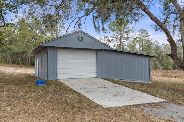 garage featuring a yard