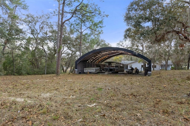 exterior space with a carport