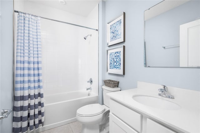 full bathroom featuring toilet, vanity, tile patterned floors, and shower / bath combo with shower curtain