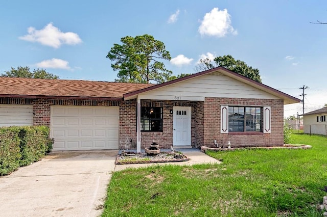 ranch-style home featuring a garage and a front lawn