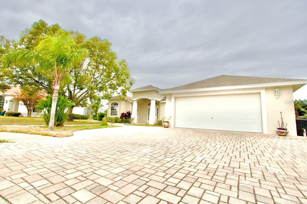 view of front of property with a garage