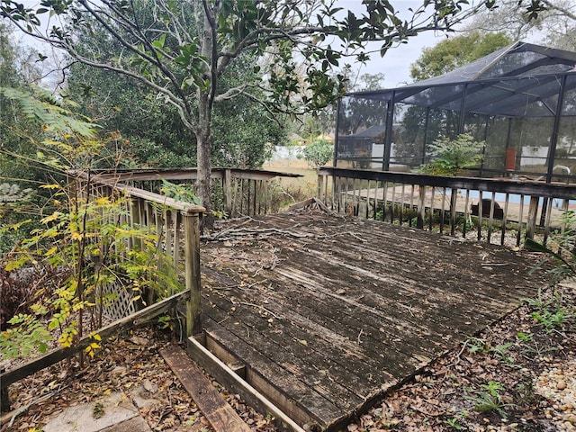 wooden deck with glass enclosure