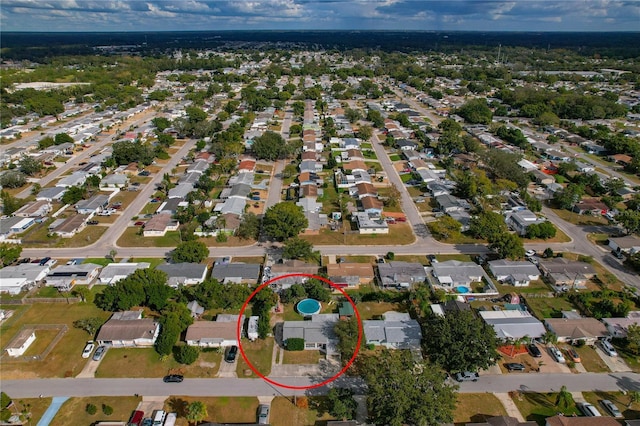 aerial overview of property's location featuring nearby suburban area