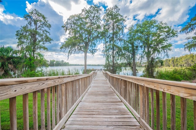 view of home's community with a water view