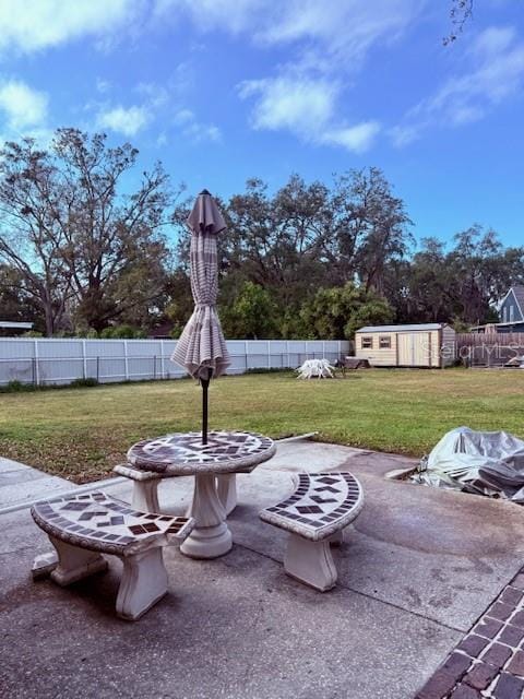 view of patio / terrace featuring a shed