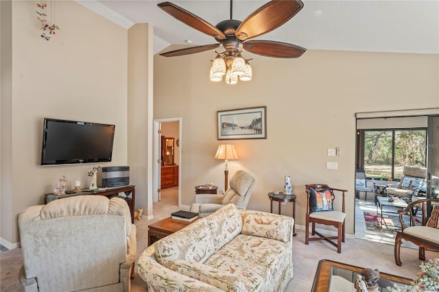 carpeted living room with high vaulted ceiling and ceiling fan