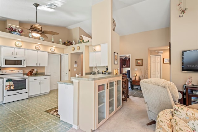 kitchen featuring white cabinetry, white appliances, tile patterned floors, and ceiling fan