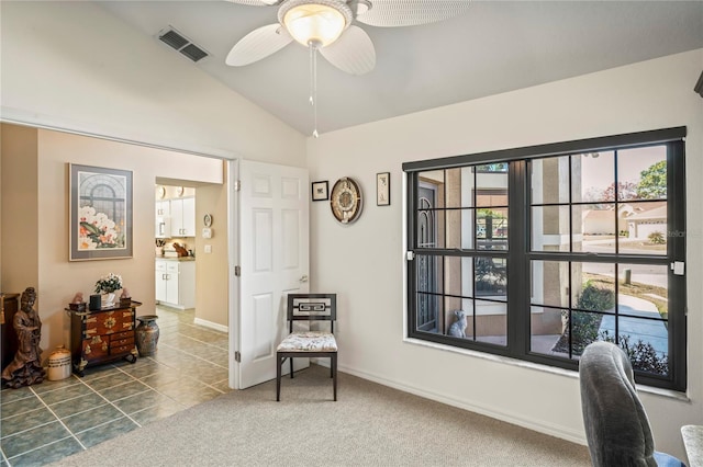 office featuring ceiling fan, lofted ceiling, and carpet