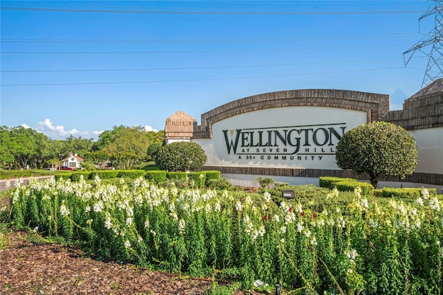 view of community sign