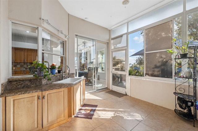 sunroom / solarium with sink