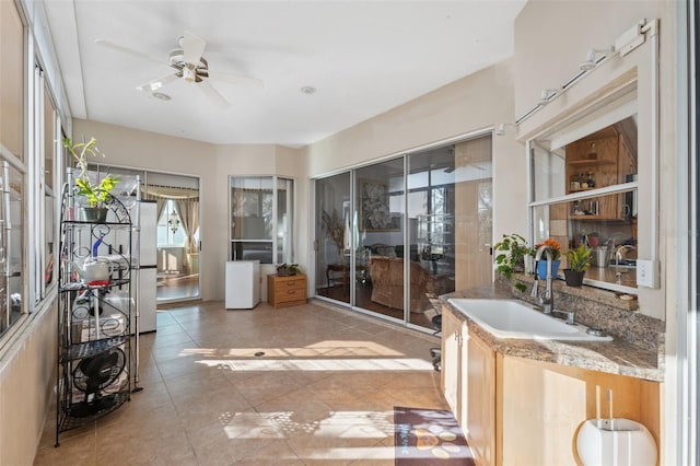 bathroom with vanity, tile patterned floors, and ceiling fan