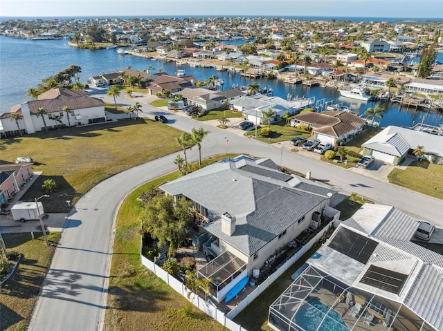 bird's eye view with a water view